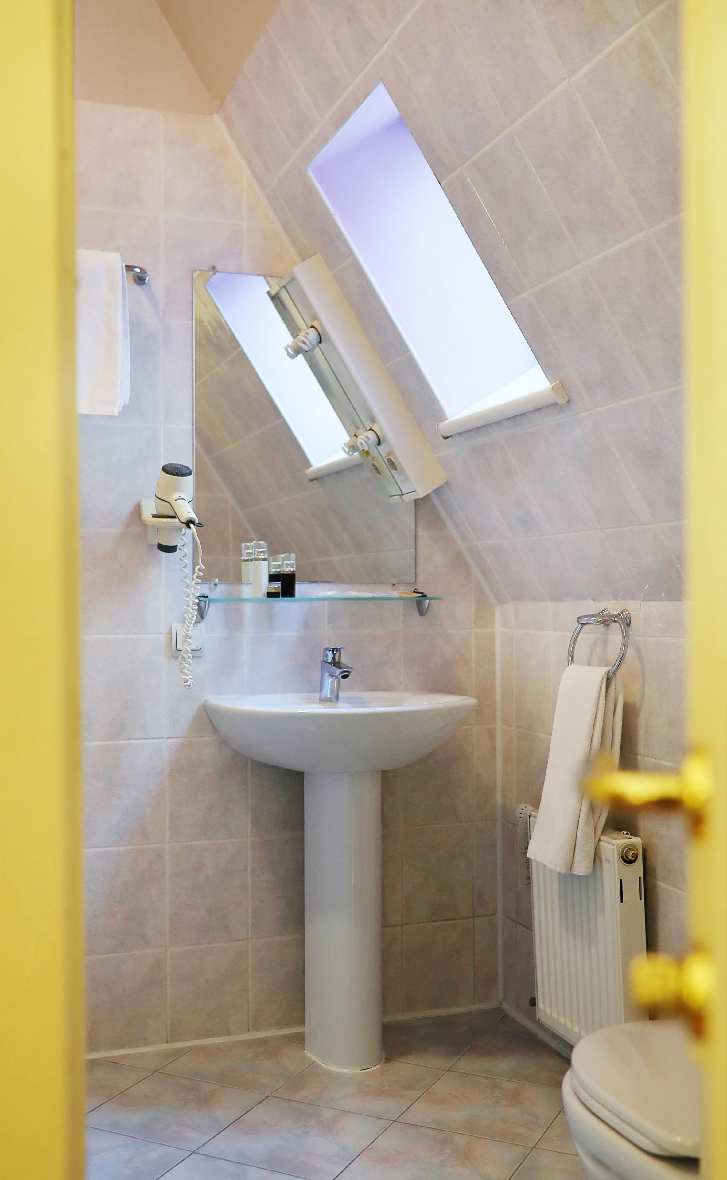classic single room | bathroom | rainfall showerhead, designer toiletries, hair dryer, slippers