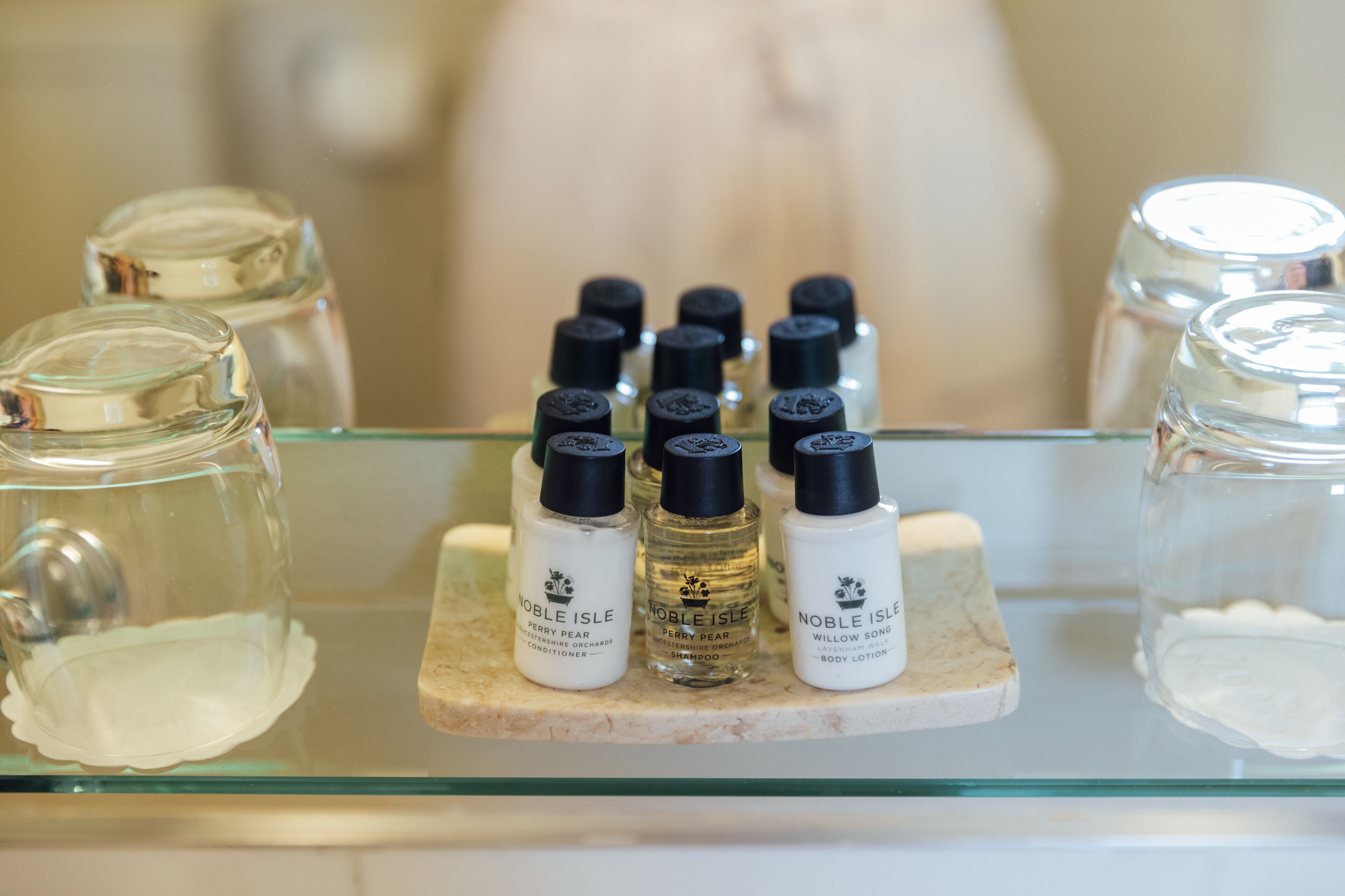 combined shower/bathtub, designer toiletries, hair dryer, towels