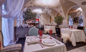 Breakfast, lunch, dinner served; Eastern European cuisine, garden views 