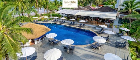 4 outdoor pools, open 8:00 AM to 8:00 PM, pool umbrellas, pool loungers
