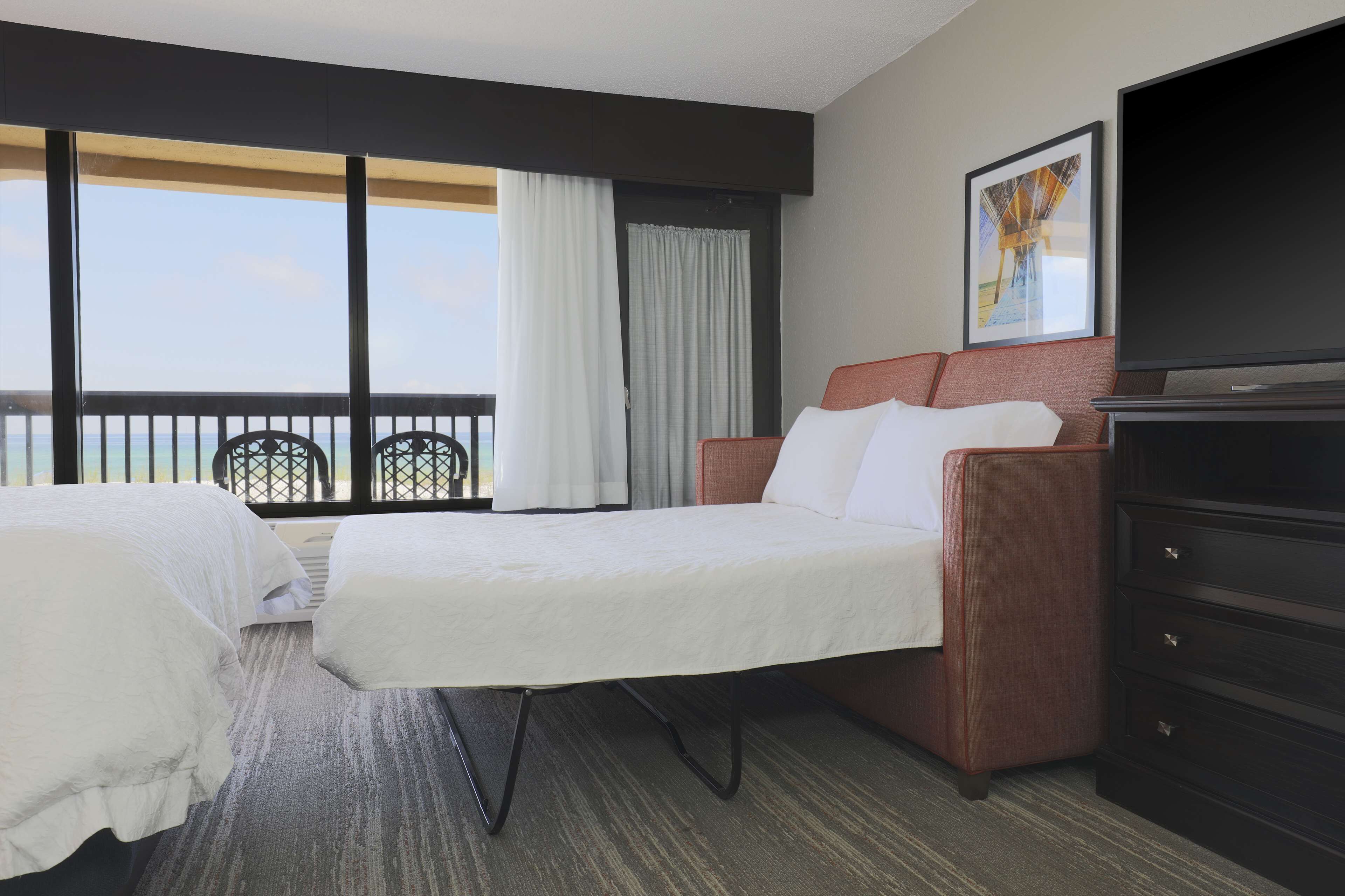 room, multiple beds, non smoking, ocean view | living area | 32-inch lcd tv with cable channels, tv