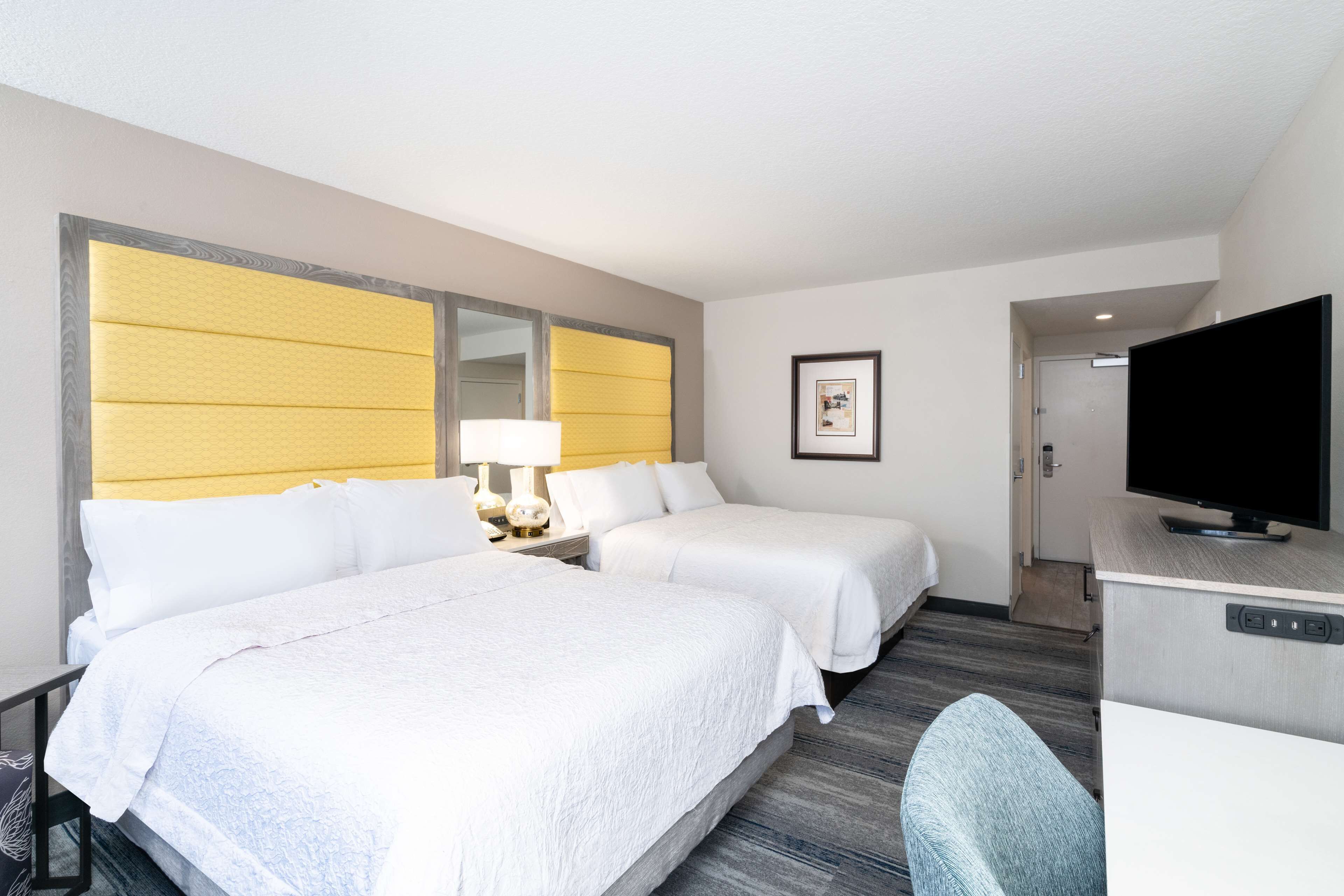 pillow-top beds, desk, laptop workspace, iron/ironing board