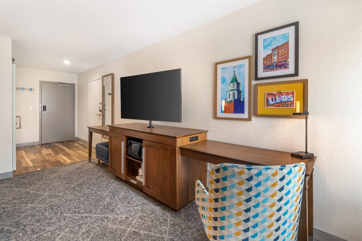 Premium bedding, desk, laptop workspace, blackout curtains