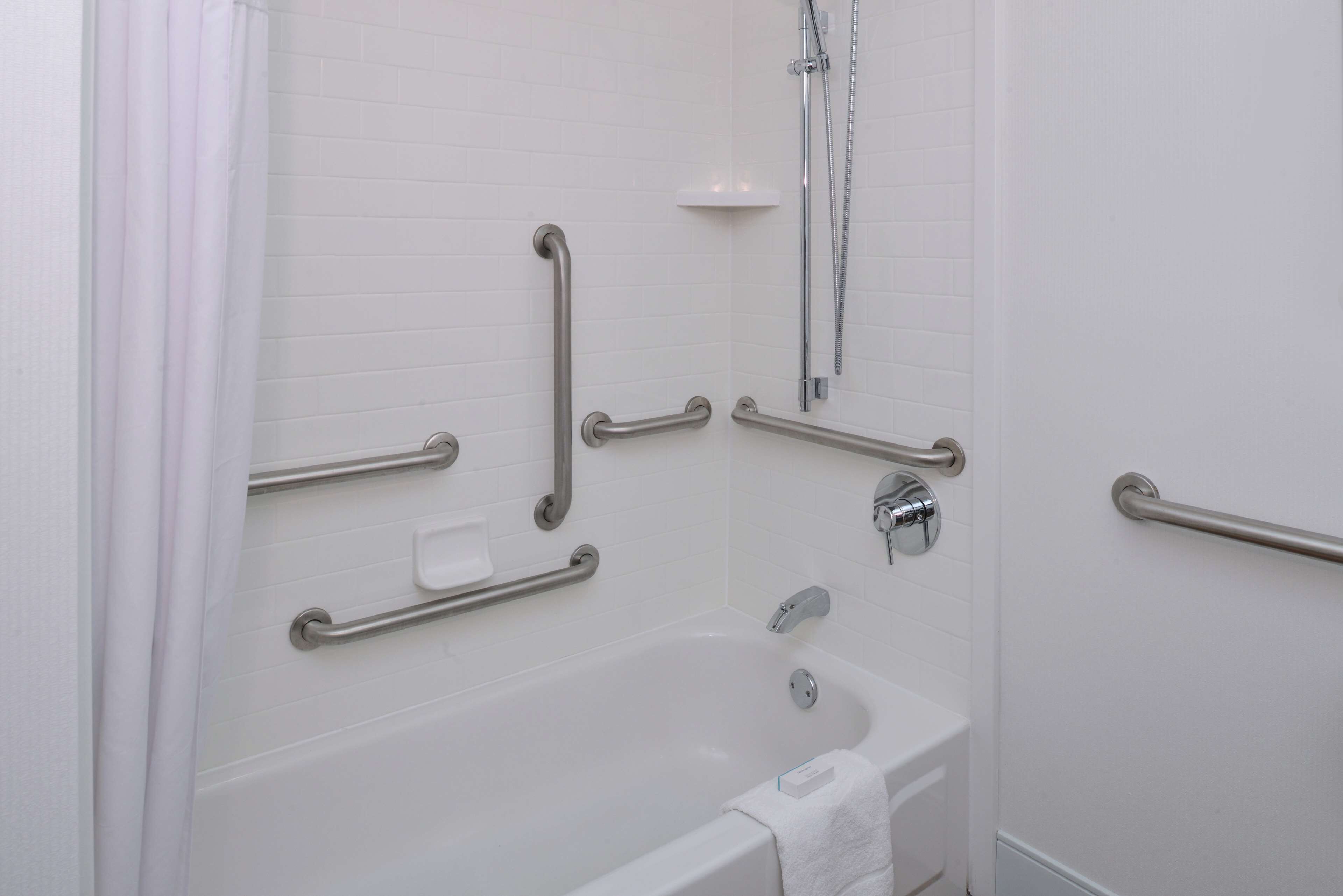 combined shower/bathtub, free toiletries, hair dryer, towels