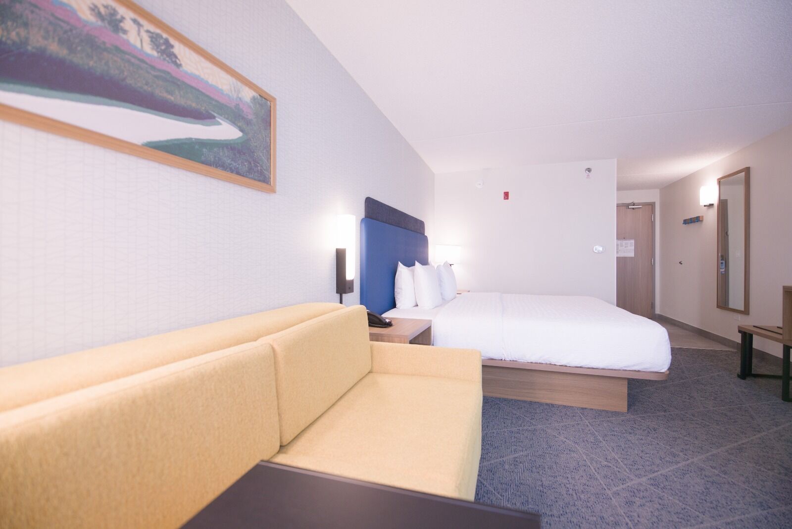 premium bedding, down duvets, blackout curtains, iron/ironing board