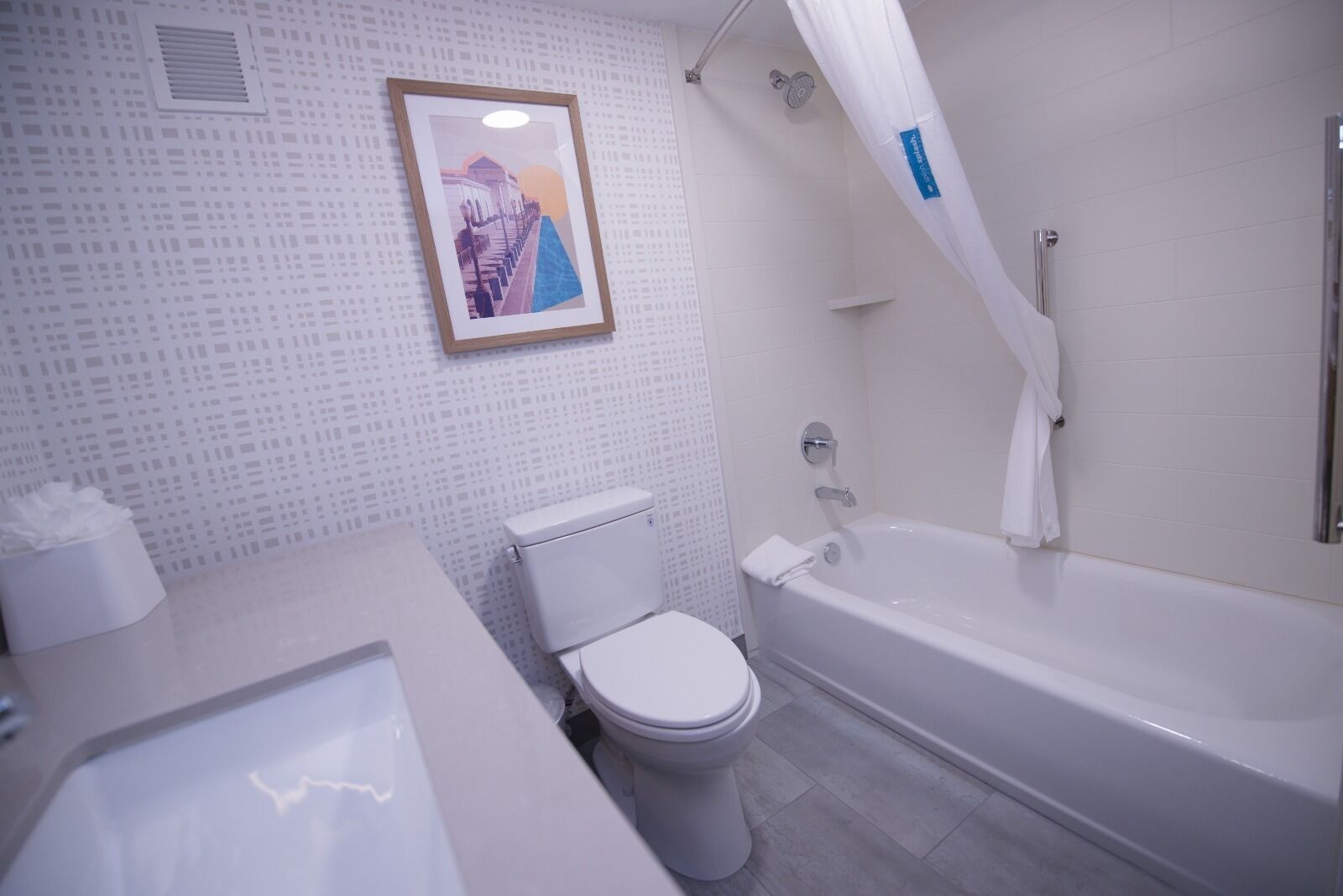 premium bedding, down duvets, blackout curtains, iron/ironing board