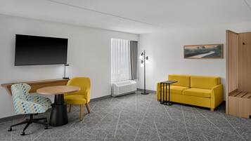 Premium bedding, down comforters, blackout drapes, iron/ironing board