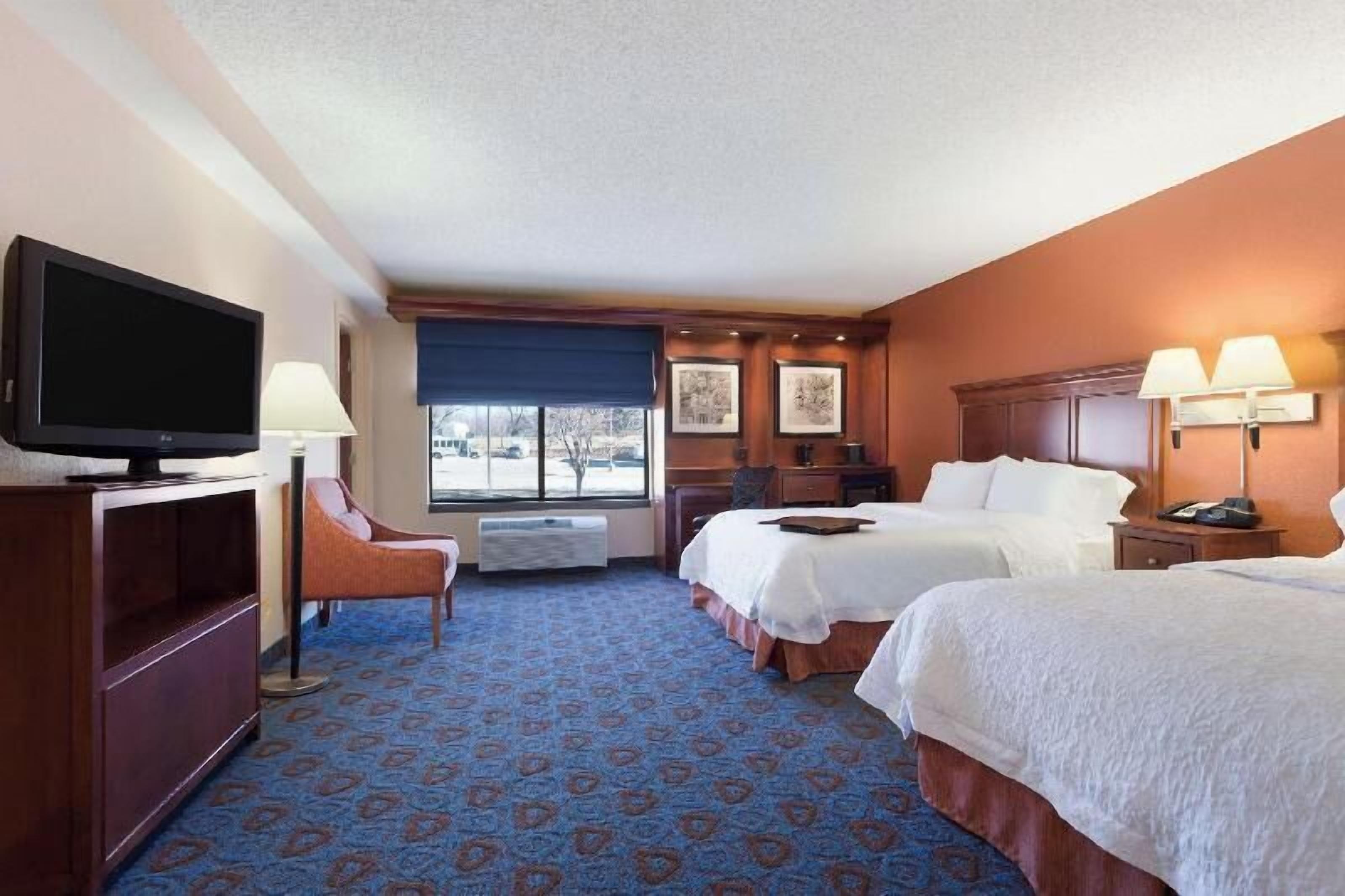 Hypo-allergenic bedding, down comforters, pillowtop beds, minibar