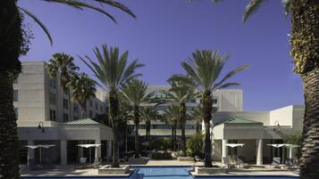 Outdoor pool, open 6:00 AM to 8:00 PM, pool umbrellas, sun loungers