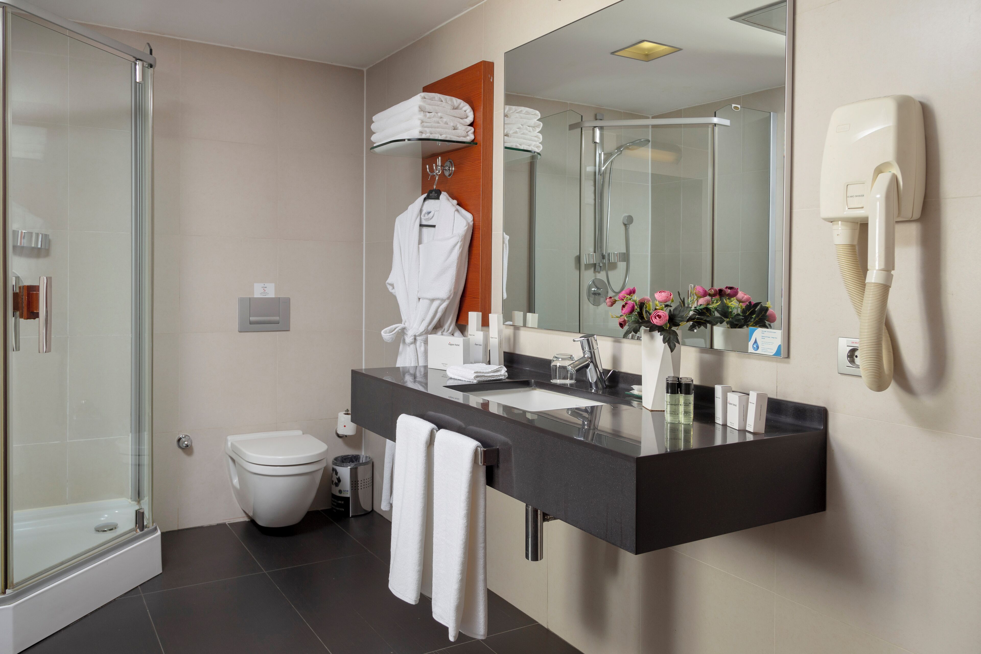 suite | bathroom | free toiletries, hair dryer, slippers, bidet