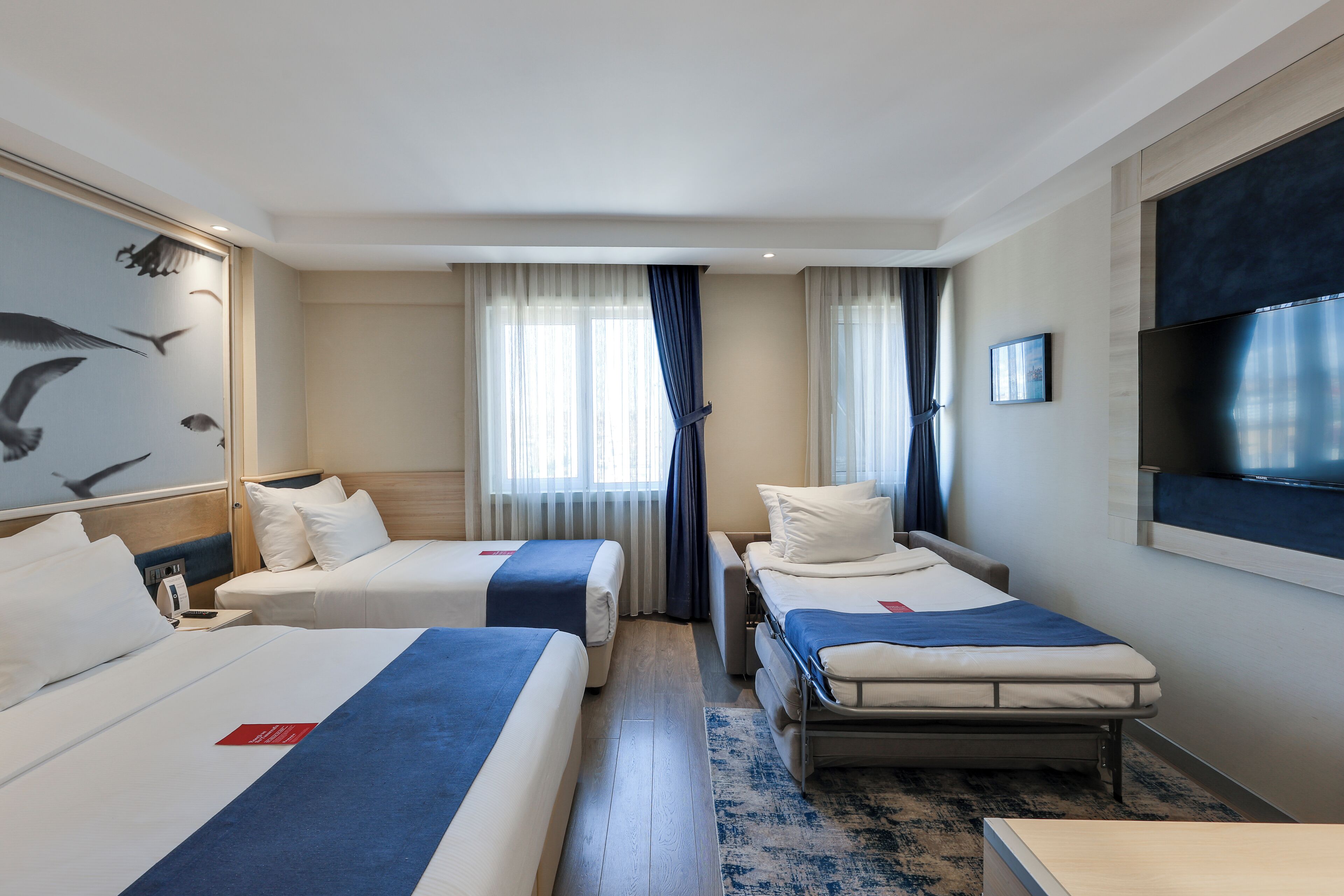 executive room, multiple beds | premium bedding, minibar, in-room safe, desk
