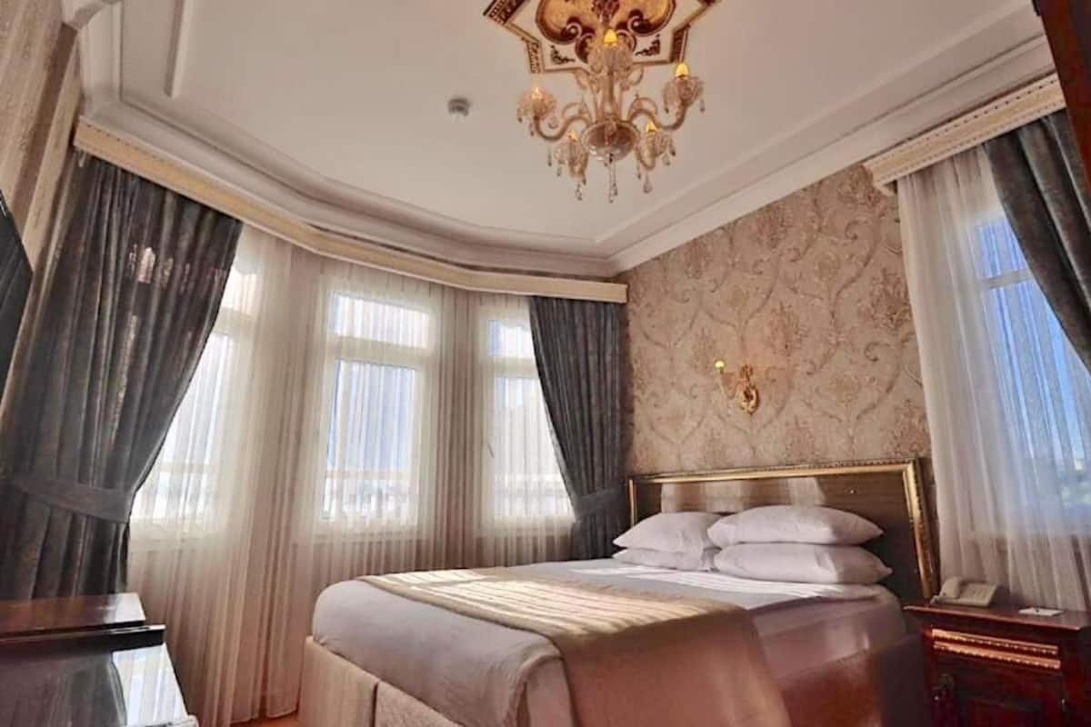 Chambre Double Deluxe, vue mer | Literie de qualité supérieure, minibar, coffres-forts dans les chambres
