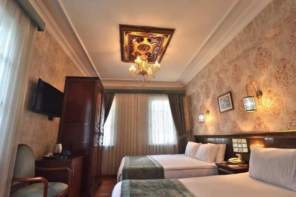 Chambre Triple Supérieure | Literie de qualité supérieure, minibar, coffres-forts dans les chambres