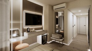 Una habitación de hotel moderna con un televisor de pantalla plana grande, una chimenea empotrada, un tocador con espejo y un vestidor.