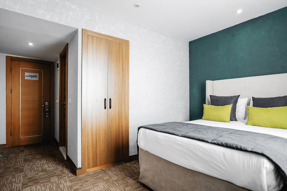 Ropa de cama de alta calidad y minibar