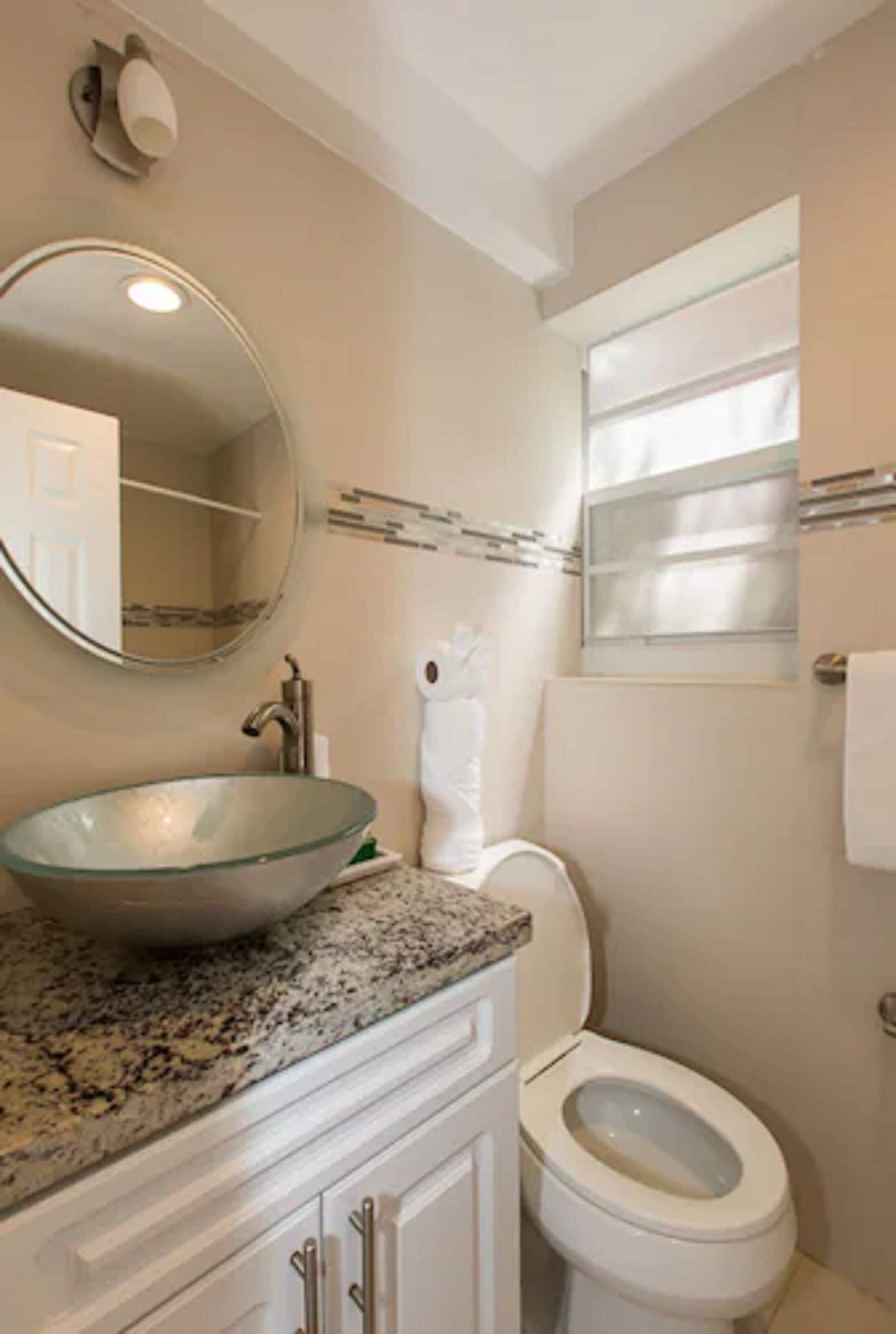 suite, 1 bedroom (2 queens and 2 doubles) | bathroom | shower, hair dryer, towels