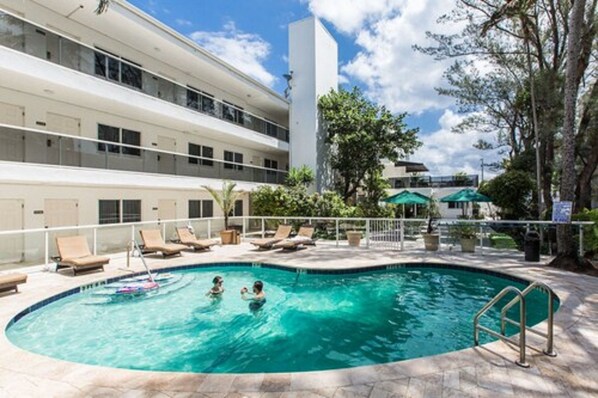 Outdoor pool, a heated pool, pool loungers
