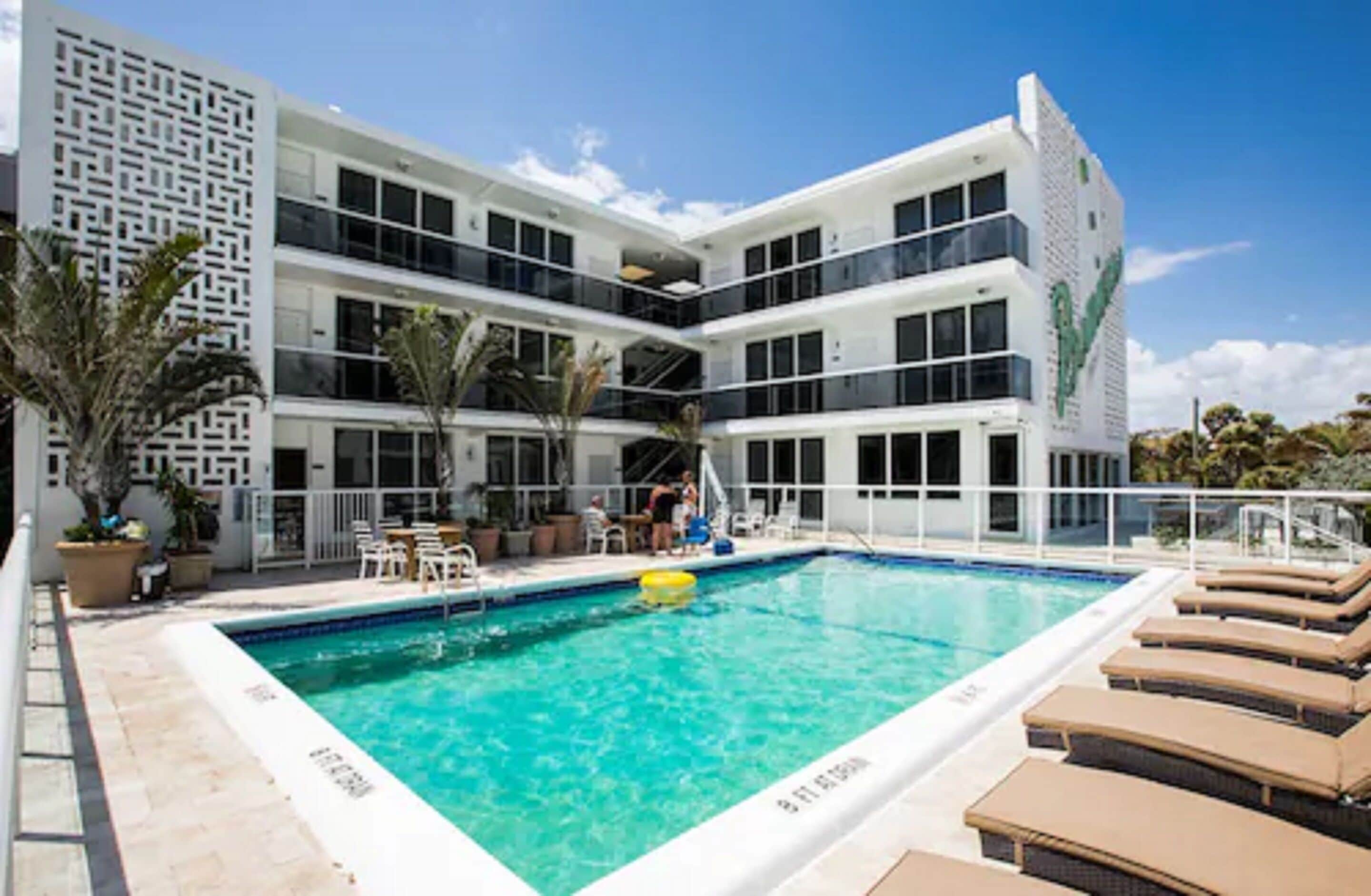 outdoor pool, a heated pool, pool loungers