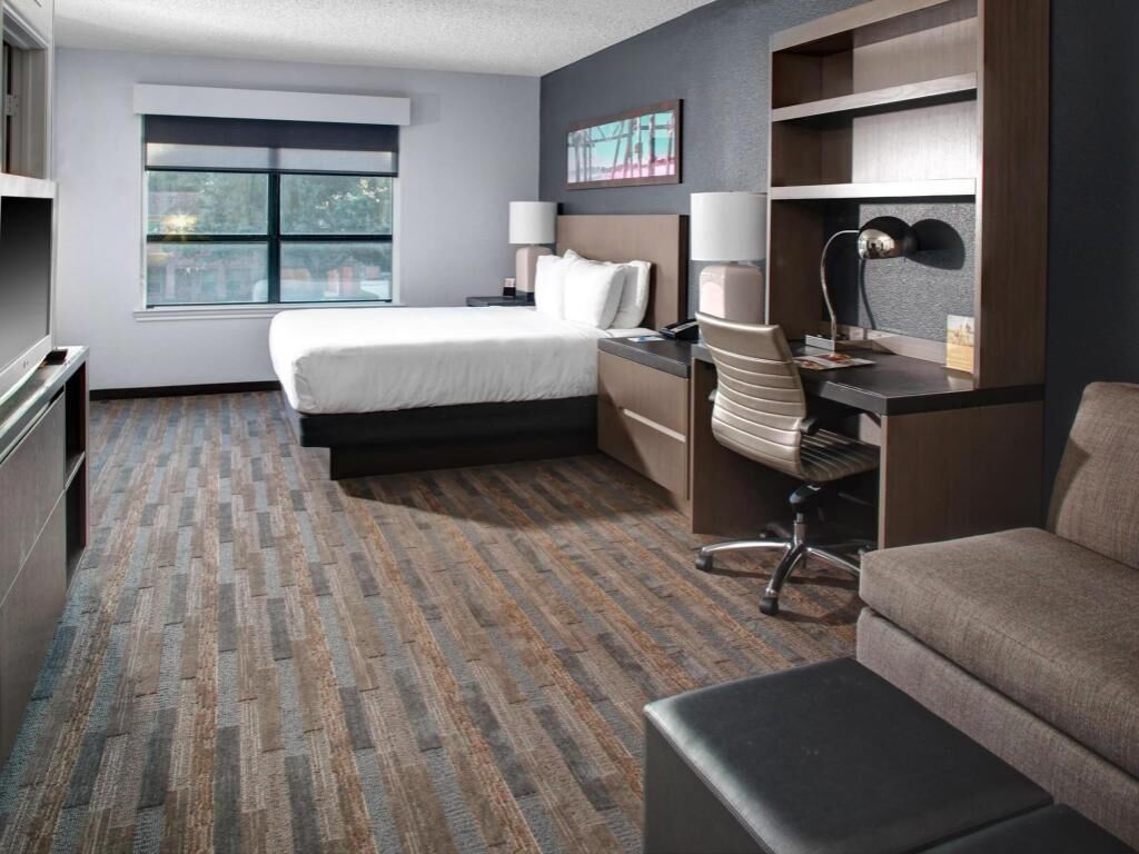 Premium bedding, desk, blackout drapes, iron/ironing board