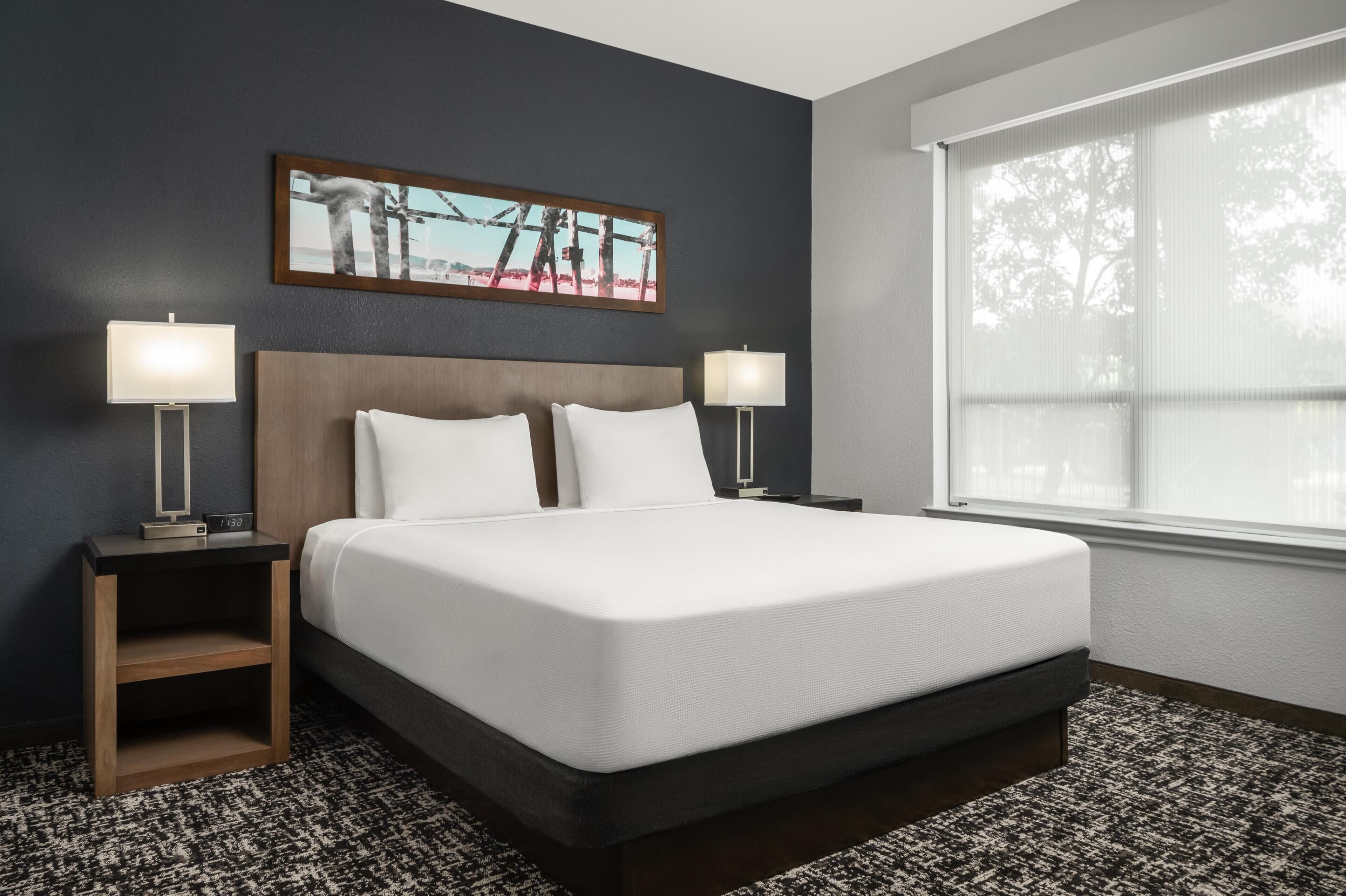 Premium bedding, desk, blackout drapes, iron/ironing board