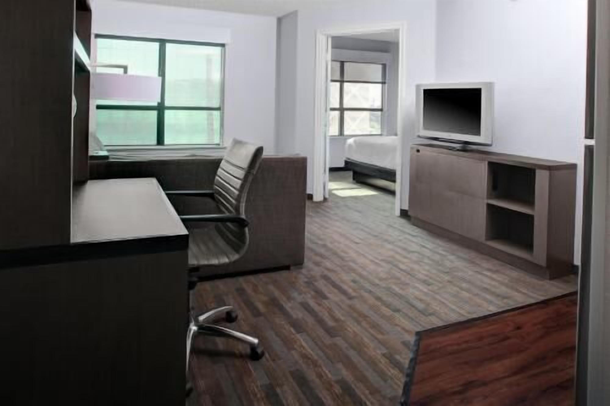Premium bedding, desk, blackout drapes, iron/ironing board