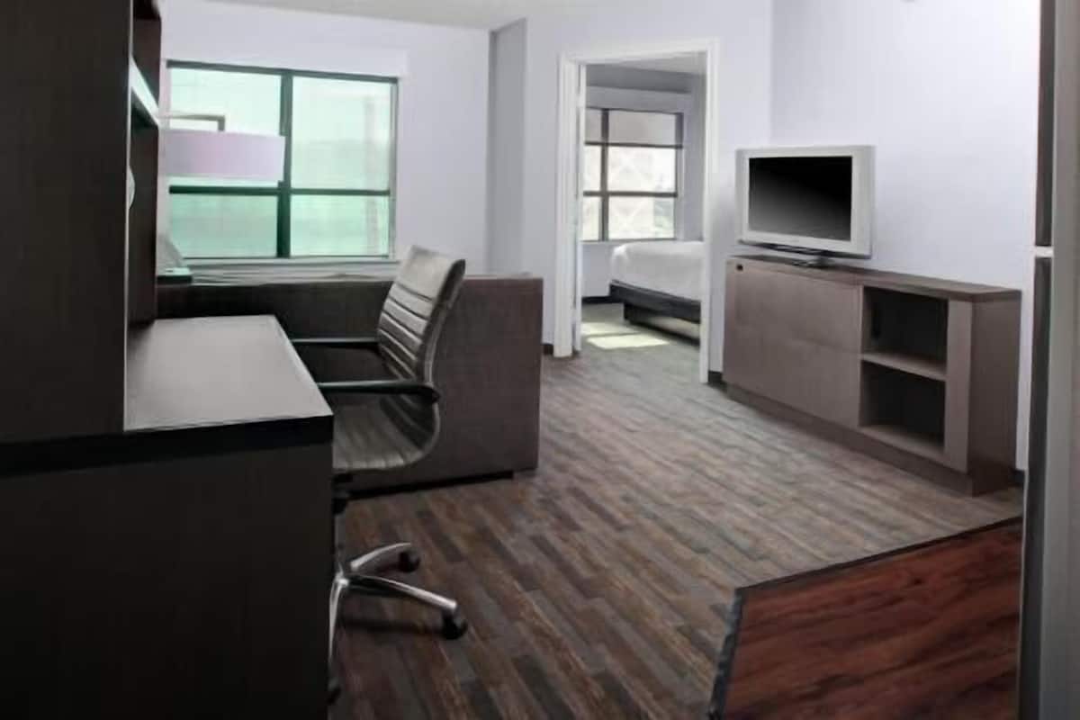 Premium bedding, desk, blackout drapes, iron/ironing board