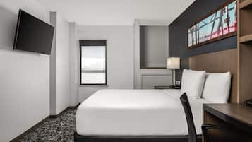 Premium bedding, desk, blackout drapes, iron/ironing board