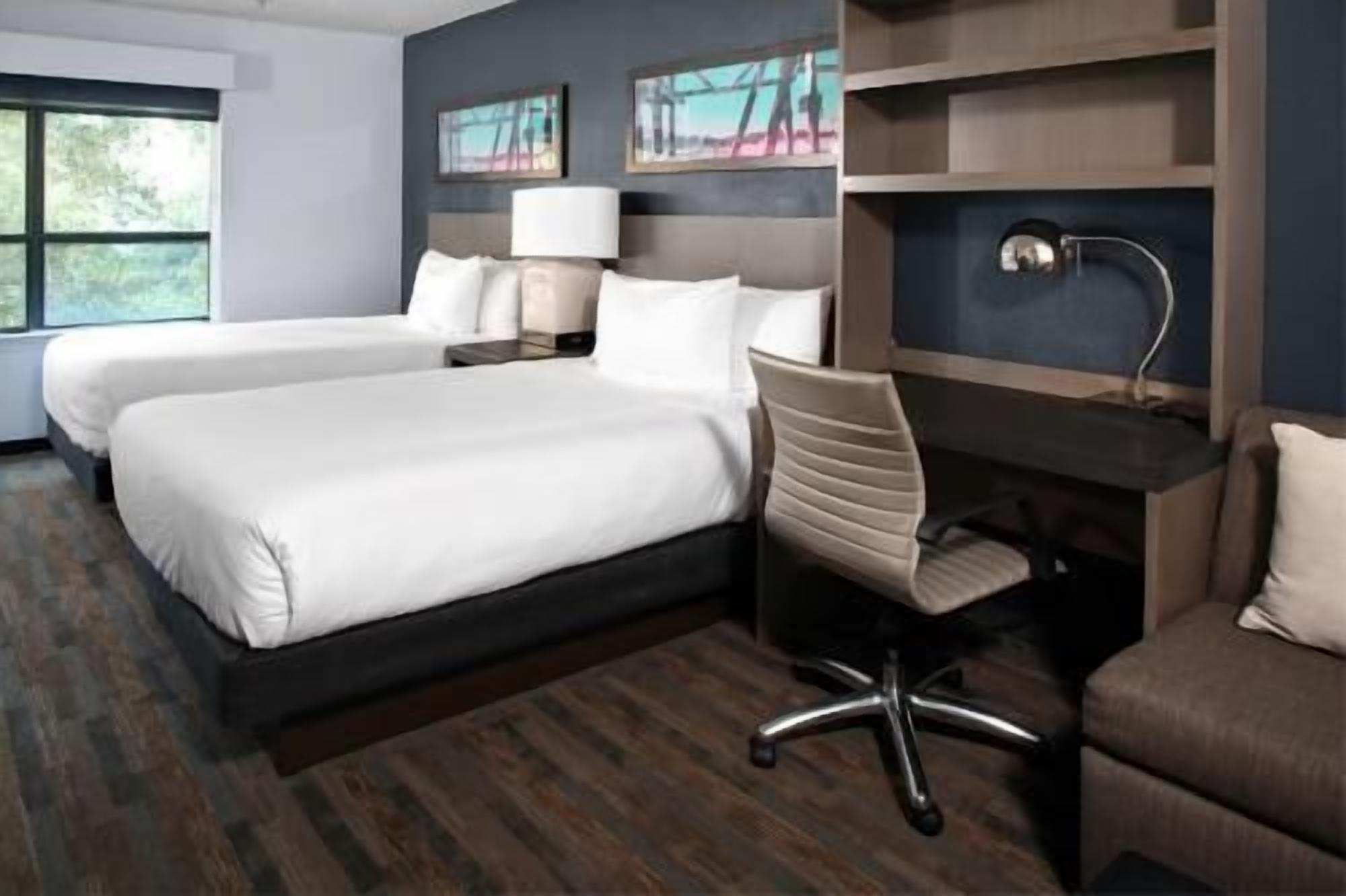 Premium bedding, desk, blackout drapes, iron/ironing board
