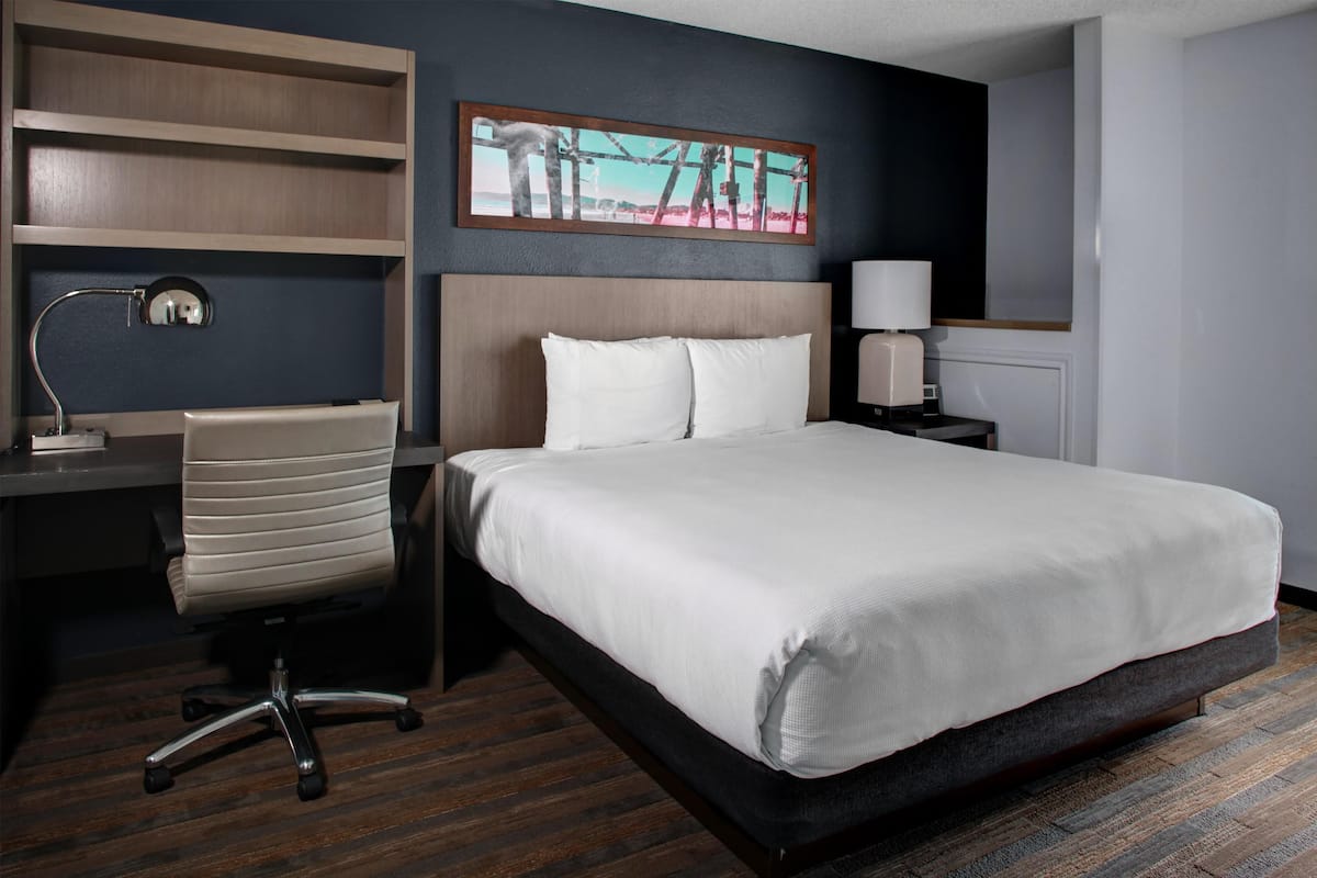 Premium bedding, desk, blackout drapes, iron/ironing board