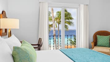 Deluxe kamer, 1 kingsize bed met slaapbank (Beachfront One Bedroom Suite) | Luxe beddengoed, pillowtop-bedden, een kluis op de kamer