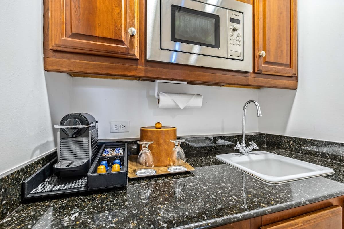 deluxe room, 1 king bed with sofa bed | private kitchenette | fridge, espresso maker, coffee/tea maker, cookware/dishes/utensils