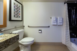 Separate bathtub and shower, designer toiletries, hair dryer, towels