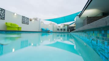 Outdoor pool, pool umbrellas, pool loungers