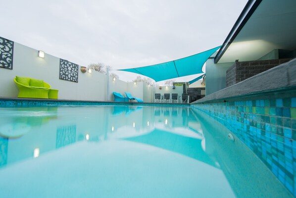 Outdoor pool, pool umbrellas, sun loungers