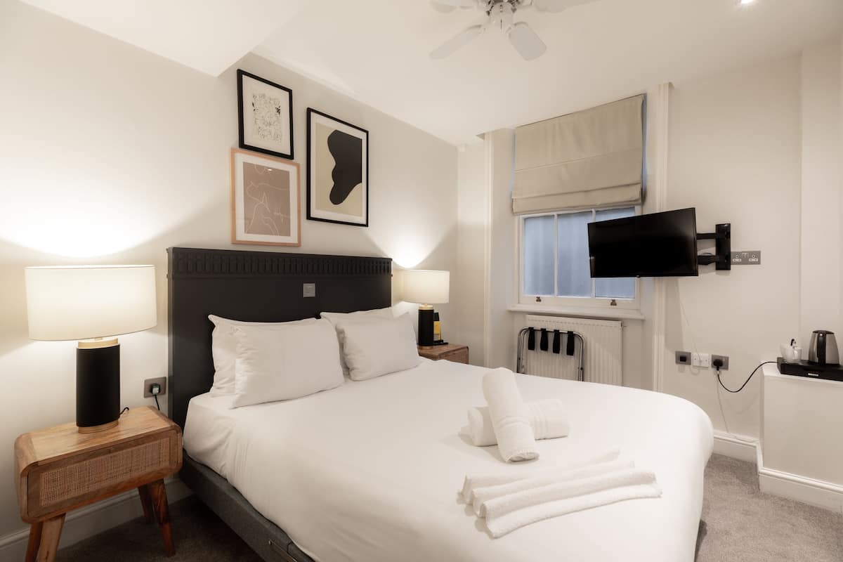 In-room safe, blackout curtains, iron/ironing board