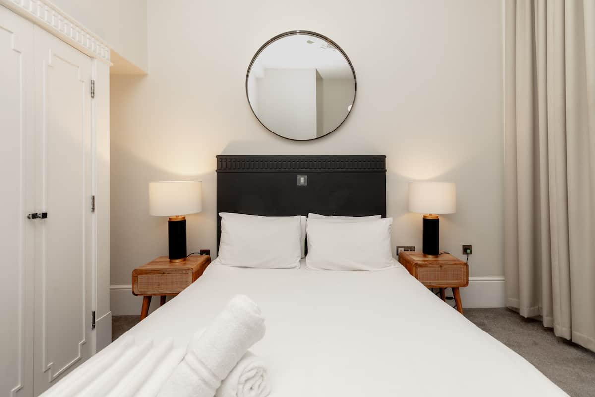 In-room safe, blackout curtains, iron/ironing board