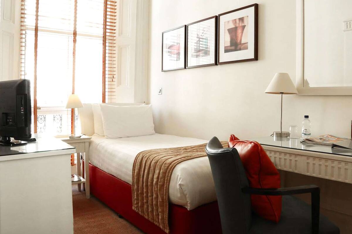 Classic Single Room, City View | In-room safe, blackout drapes, iron/ironing board