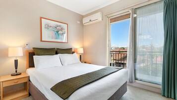 One Bedroom Apartment | Premium bedding, Select Comfort beds, desk, laptop workspace