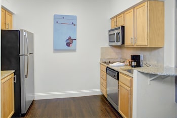 Fridge, microwave, stovetop, dishwasher at HYATT house Dallas/Lincoln Park
