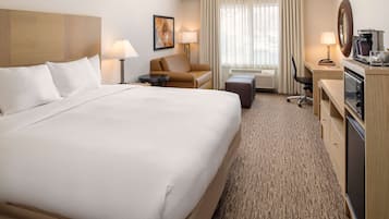 Hypo-allergenic bedding, down comforters, pillowtop beds, in-room safe