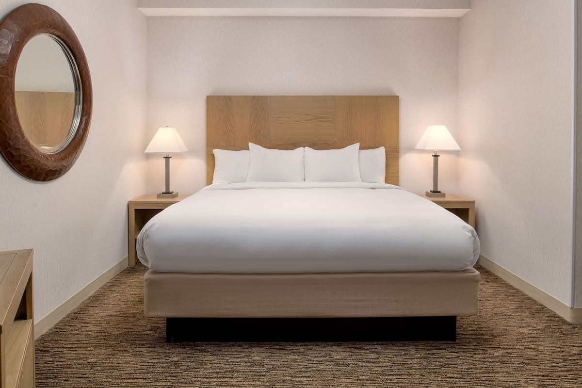 Hypo-allergenic bedding, down duvets, pillow-top beds, in-room safe