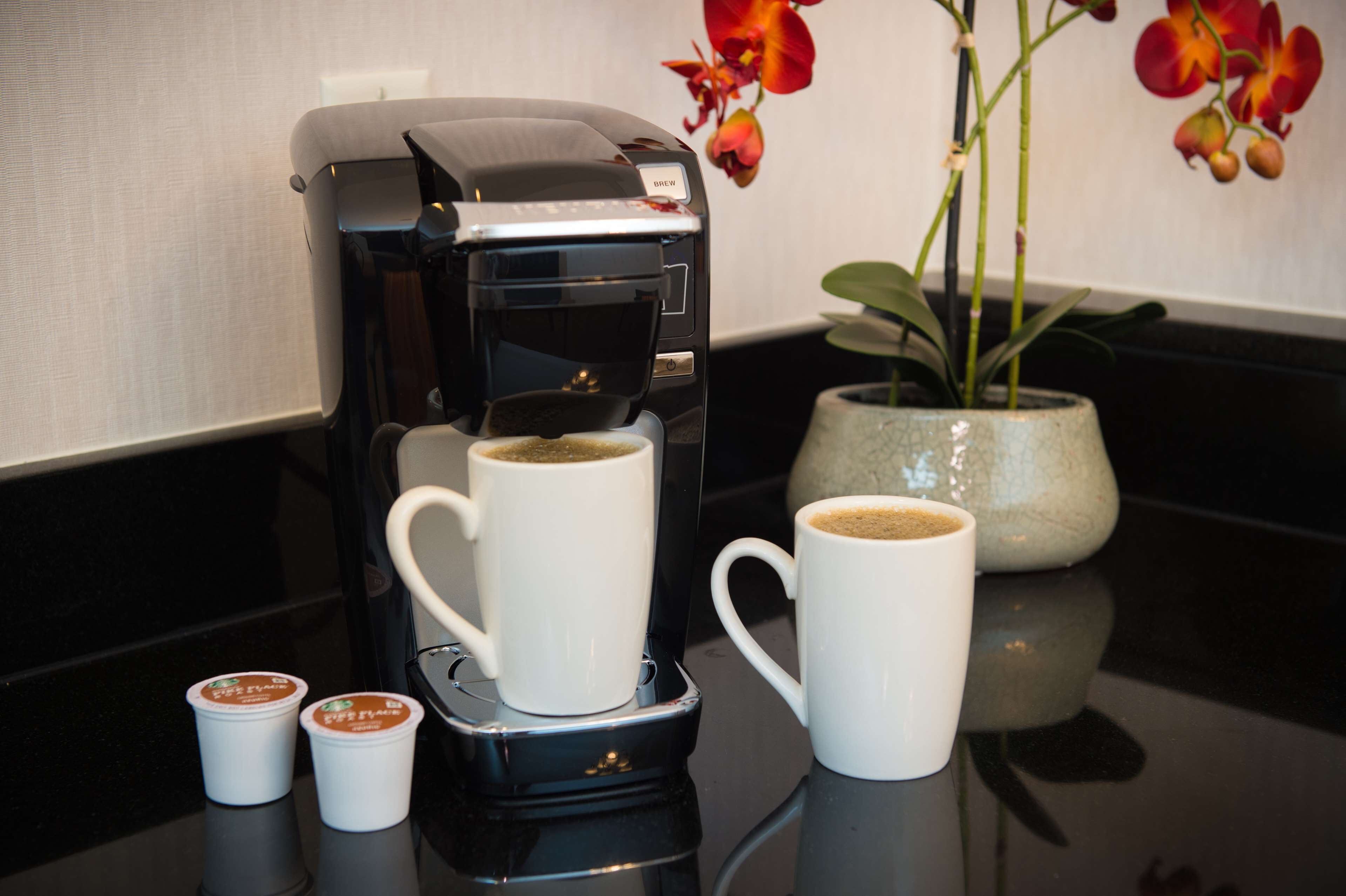 hypo-allergenic bedding, down duvets, pillow-top beds, in-room safe