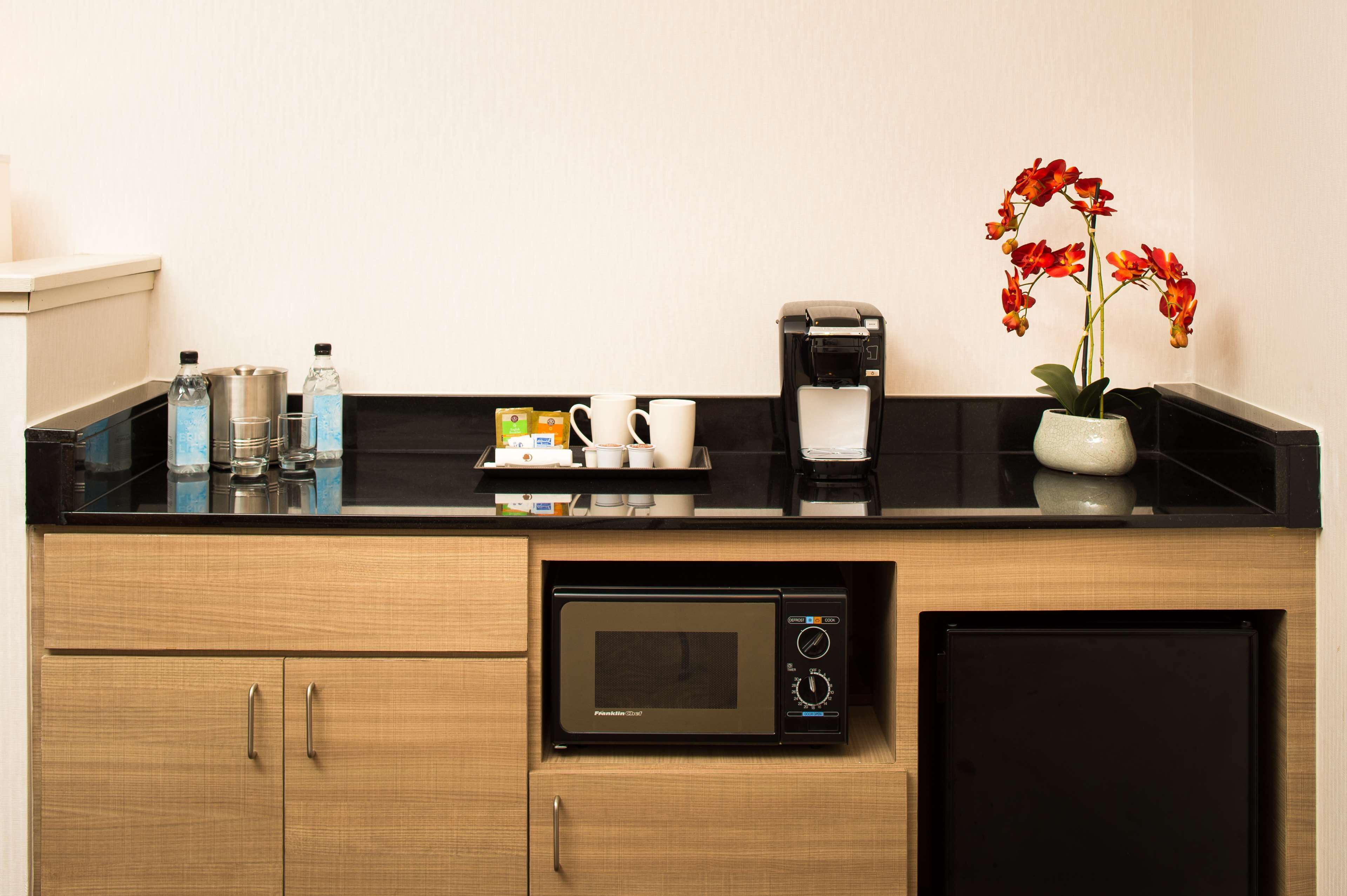 junior studio suite, 1 king bed with sofa bed | private kitchen | mini-fridge, microwave, coffee/tea maker