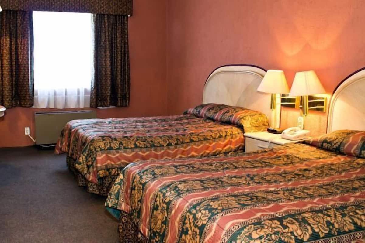 Premium bedding, down duvets, in-room safe, desk
