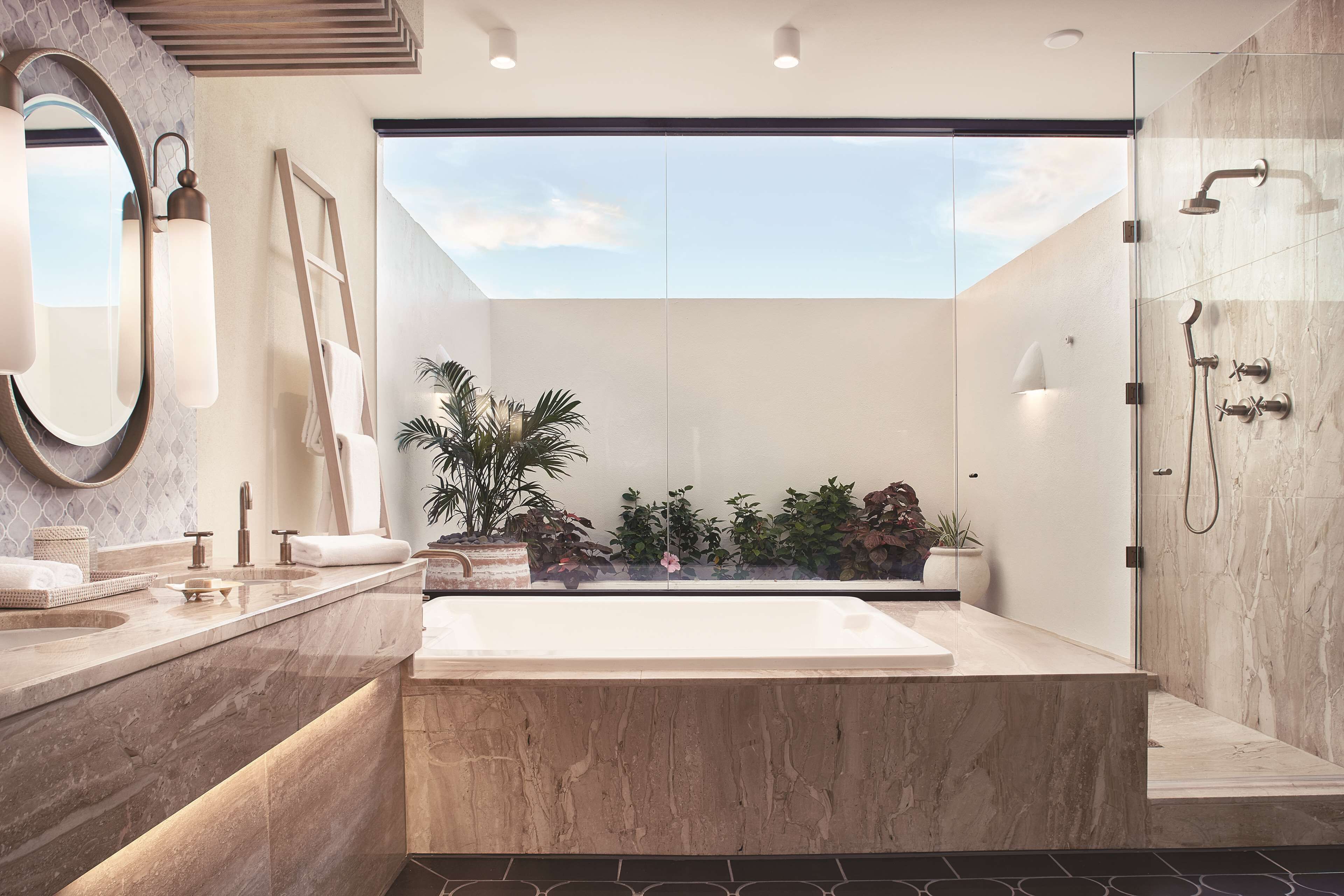 separate bathtub and shower, deep-soaking bathtub, rainfall showerhead