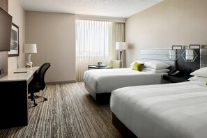 Premium bedding, down comforters, pillowtop beds, in-room safe