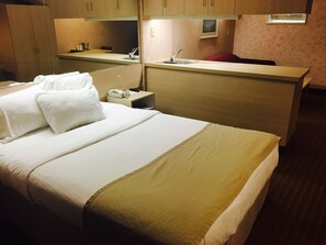 Suite, 1 Queen Bed, Non Smoking | In-room safe, desk, blackout curtains, iron/ironing board