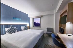 Down comforters, minibar, desk, blackout drapes