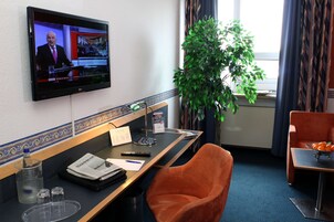 32-inch flat-screen TV with satellite channels, TV