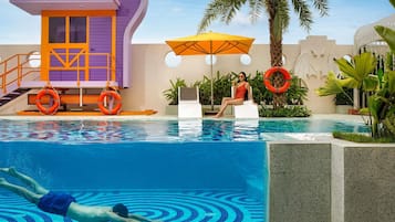 Outdoor pool, cabanas (surcharge), pool umbrellas